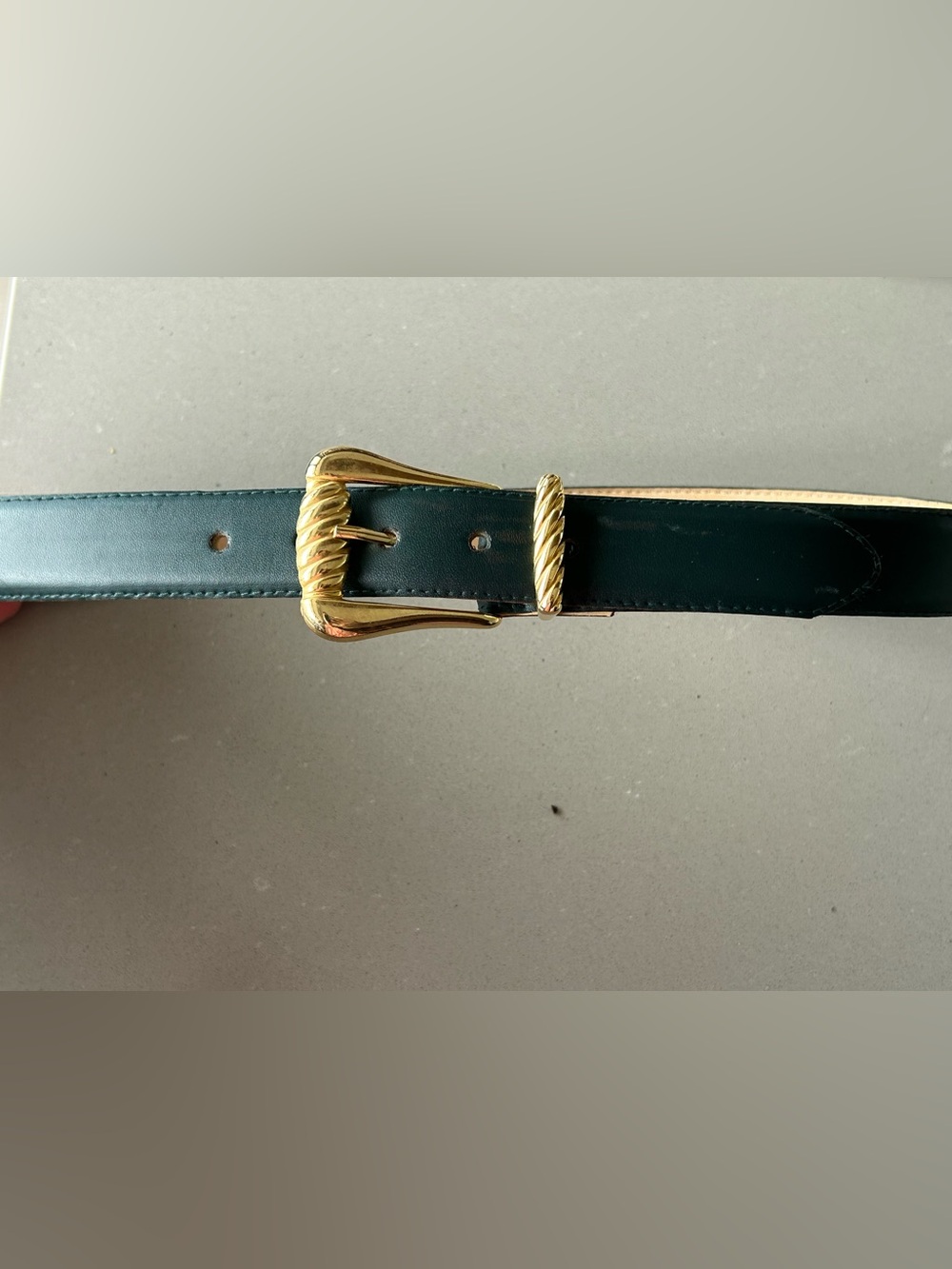 Green leather belt with gold buckle